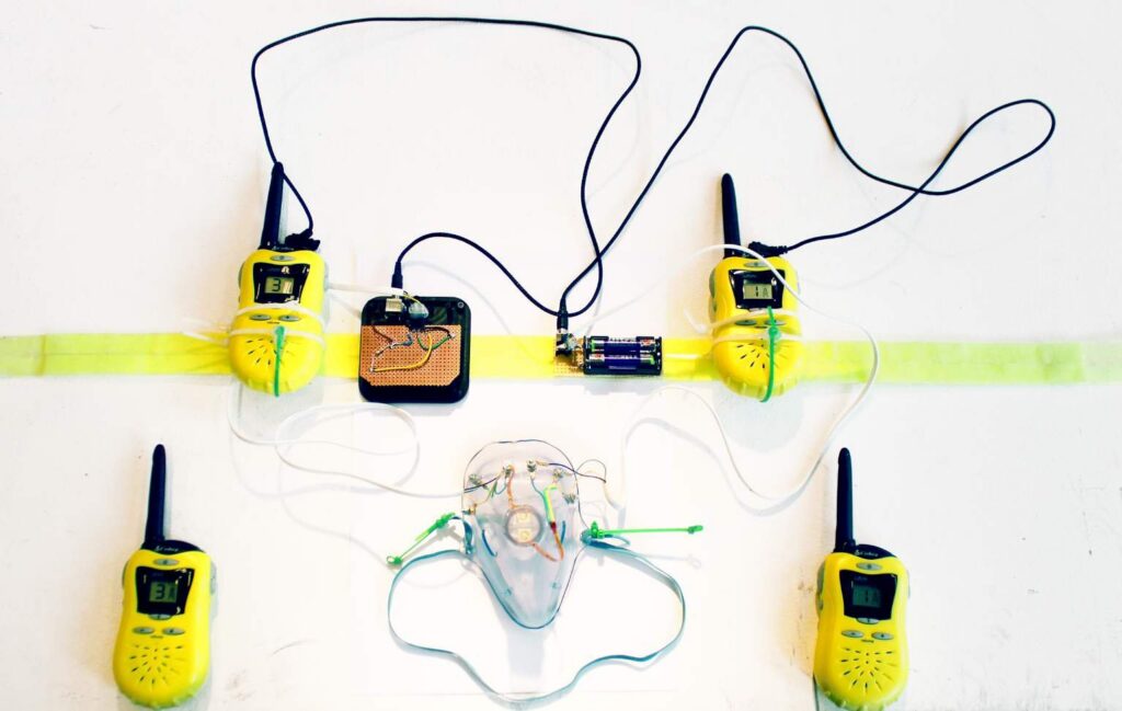 The instrument: mask, two mini-fans, walkie-talkies, analogue electronics and a belt, 2013